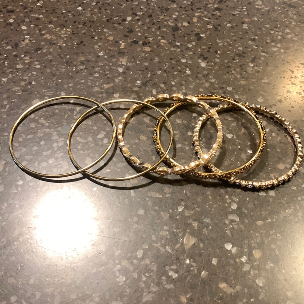 Set of five gold bracelets
